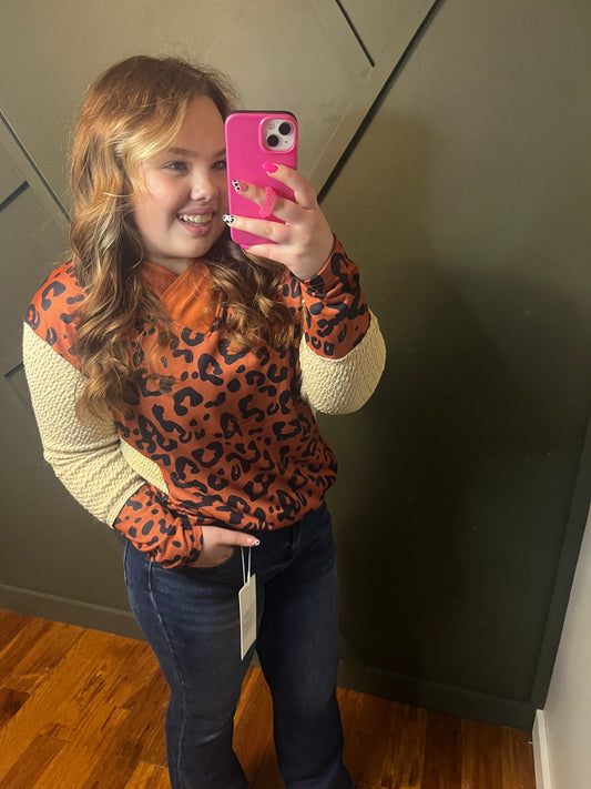 Cheetah print shirt with tan waffle sleeves